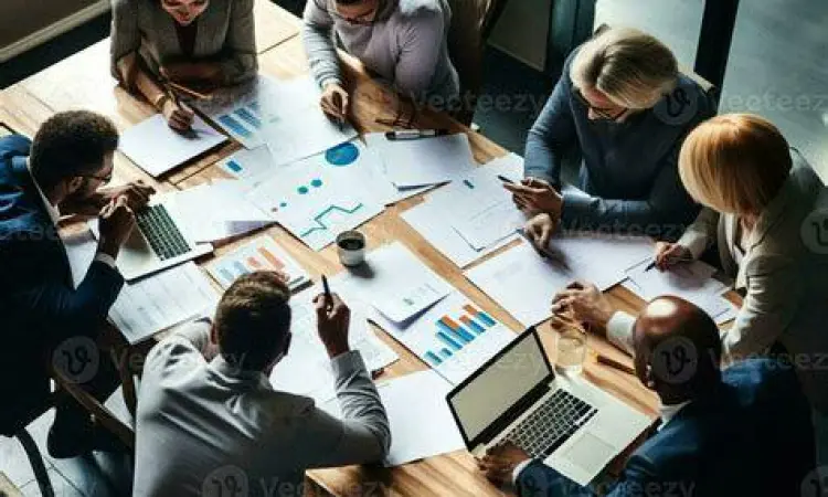 Diskusi profesional antara atasan dan bawahan