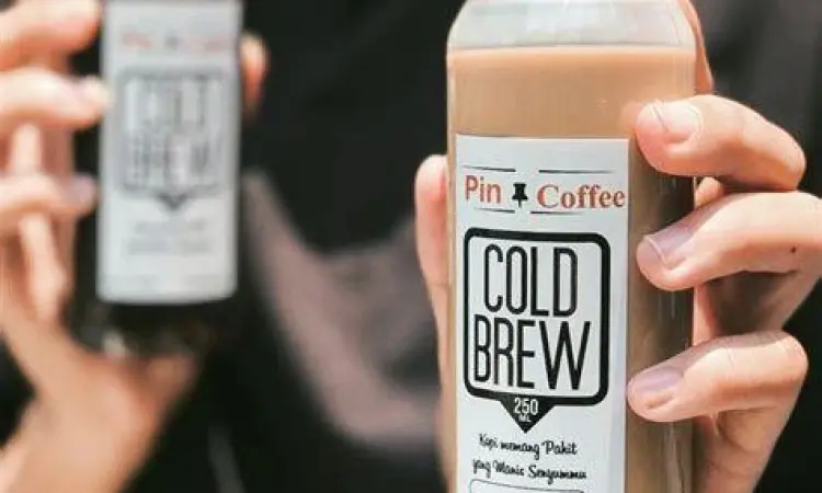 Proses desain label untuk branding minuman kemasan